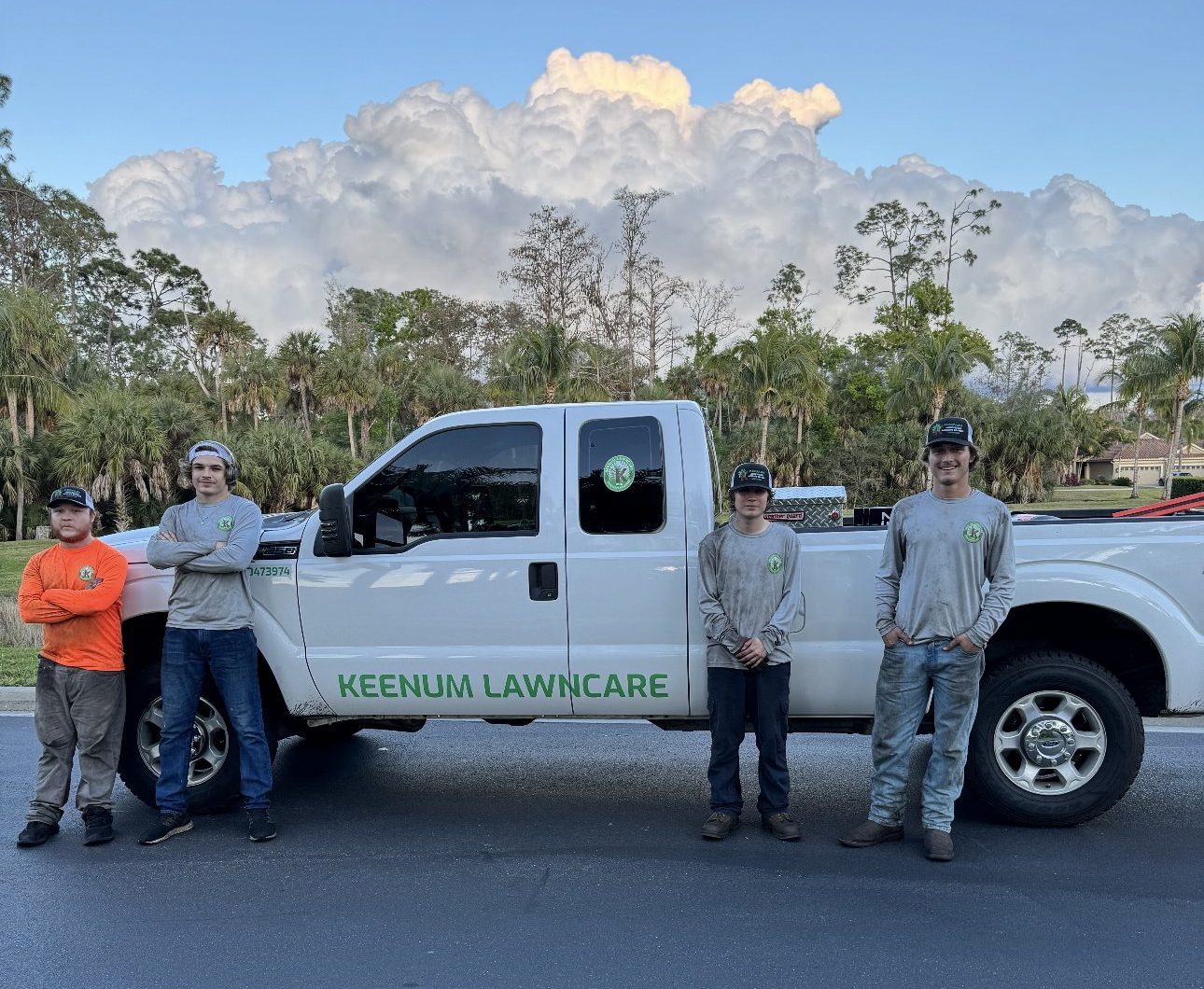 The Keenum Lawncare crew with one of the company trucks